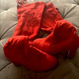 Red thigh high boots